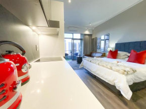 Menlyn Maine Residences Paris studio king bed